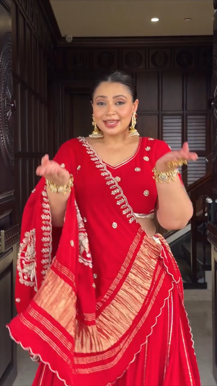 Red Gota Work Lehenga Set in motion